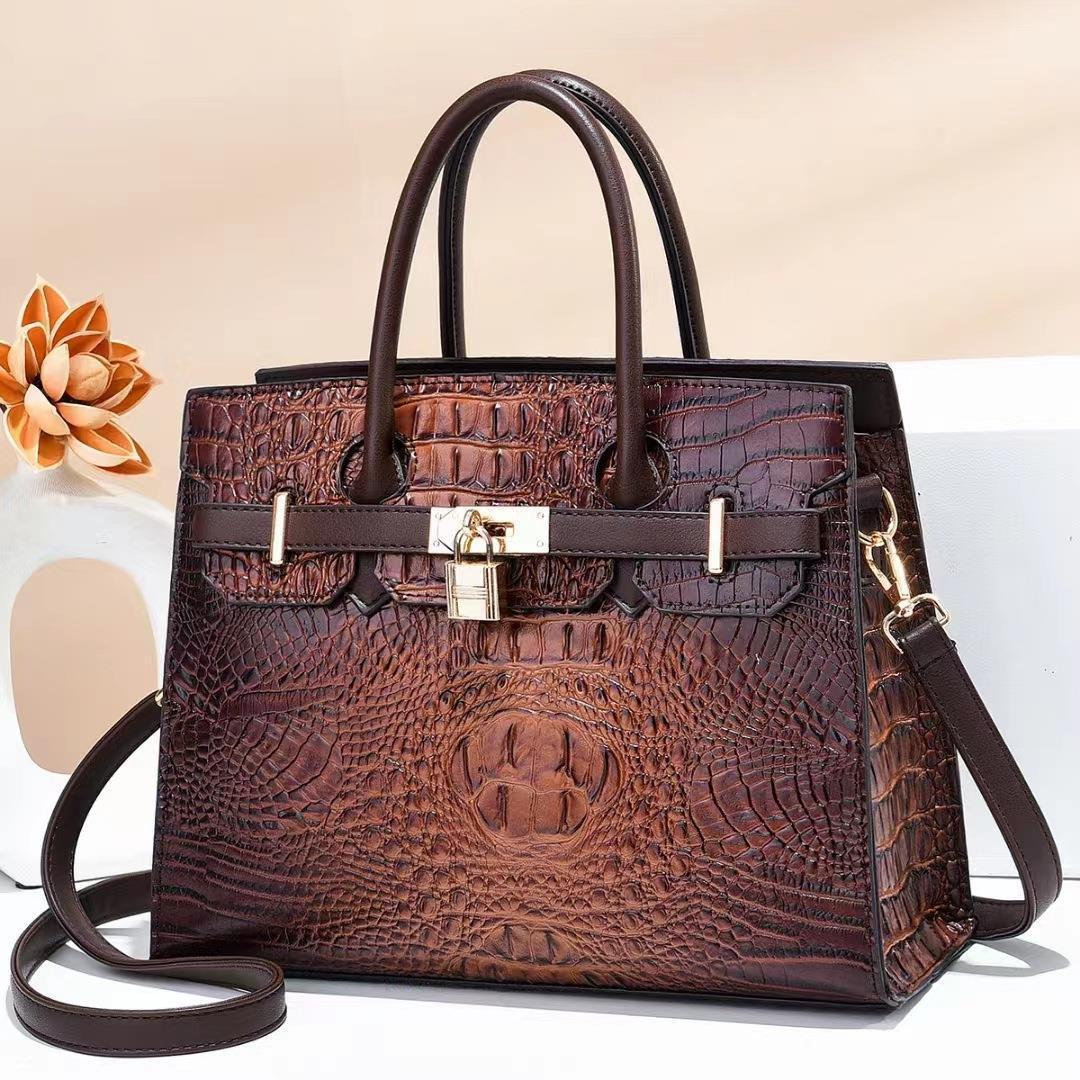 The 2022 new cross-border fashion large-capacity crocodile pattern handbag for middle-aged women Item Picture