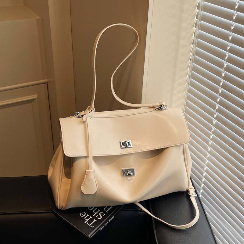 Simple urban commuter style large bag, niche design tote bag, women's large-capacity soft leather crossbody bag, versatile work bag full figure