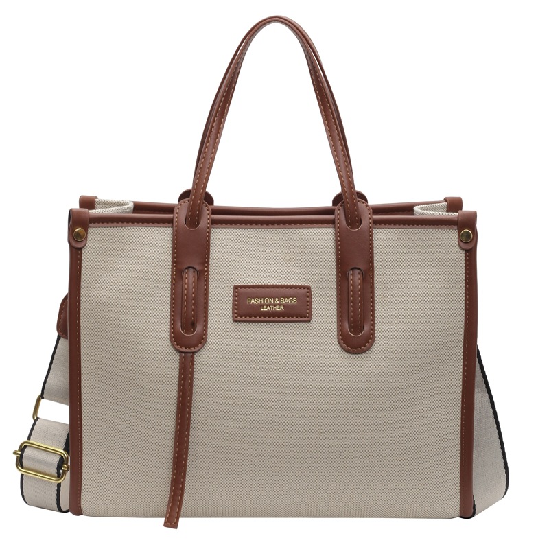 Large-capacity canvas bag for women, 2024 new style, fashionable and simple single-shoulder crossbody bag, casual commuting tote bag Item Picture