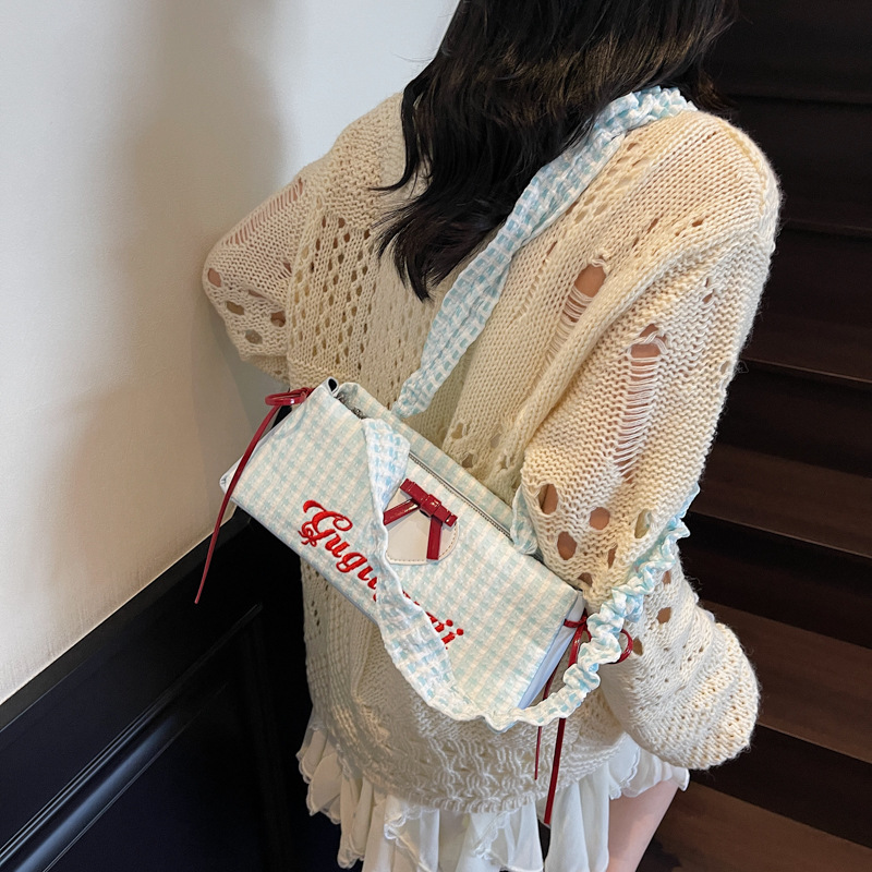 Korean sweet bow underarm bag, hand-held women's bag, 2025 summer new baguette bag, casual single-shoulder bag Specification drawing