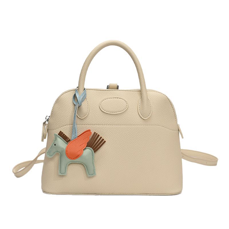 A high-end, light luxury handbag for women, 2025 new style, fashionable, simple and niche backpack, stylish and versatile shell bag Item Picture