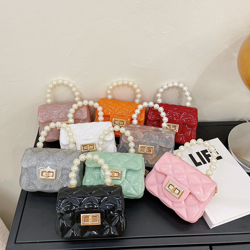 Jelly bag Southeast Asian export wholesale children's and girls' bags 2025 new style chain pearl handbag diamond-shaped girls' bag full figure