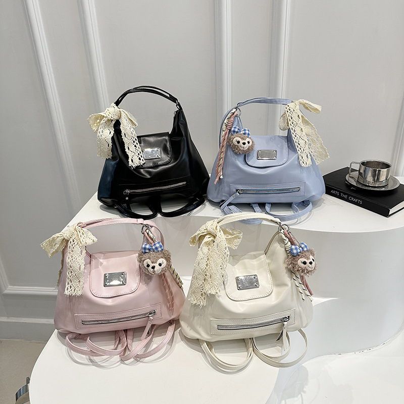 The 2025 new large-capacity college-style backpack is a versatile tote bag for women's daily commuting and a retro niche crossbody bag Application Scenario