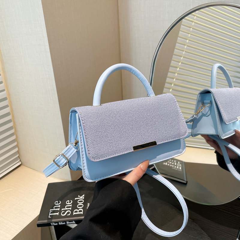 A new 2025 trendy, casual, and stylish women's single-shoulder crossbody bag with a simple and solid color design full figure