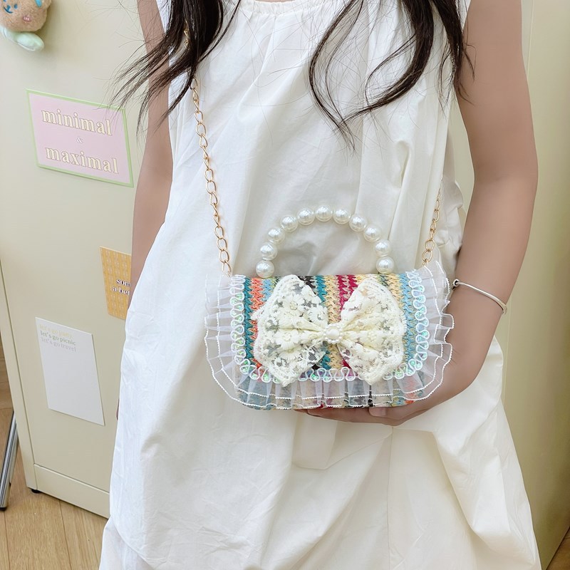 Summer new bow straw-woven pearl handbag, crossbody fashionable children's bag, cute girl kindergarten princess bag Application Scenario
