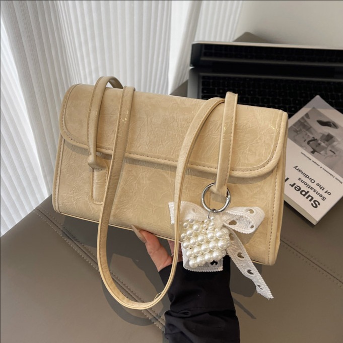 High-end handbag, niche design, underarm bag, 2025 new style, fashionable and versatile, stylish single-shoulder bag, trendy women's bag full figure
