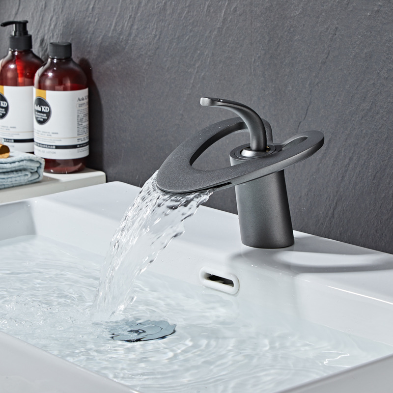 Modern and simple bathroom faucet, bathroom cabinet, washbasin faucet, hollowed-out cold and hot dual outlet faucet Specification drawing