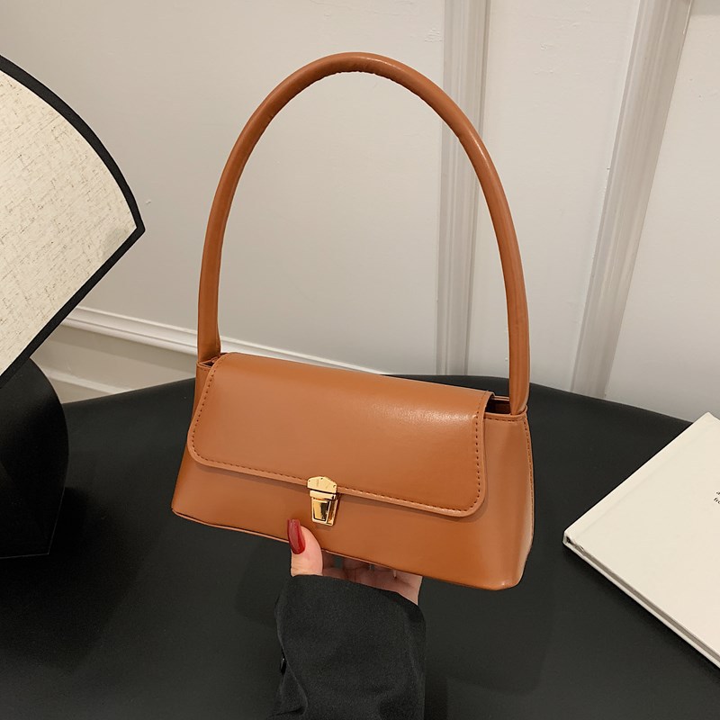A trendy and stylish French underarm bag for women in the summer of 2025, a versatile and retro single-shoulder bag full figure