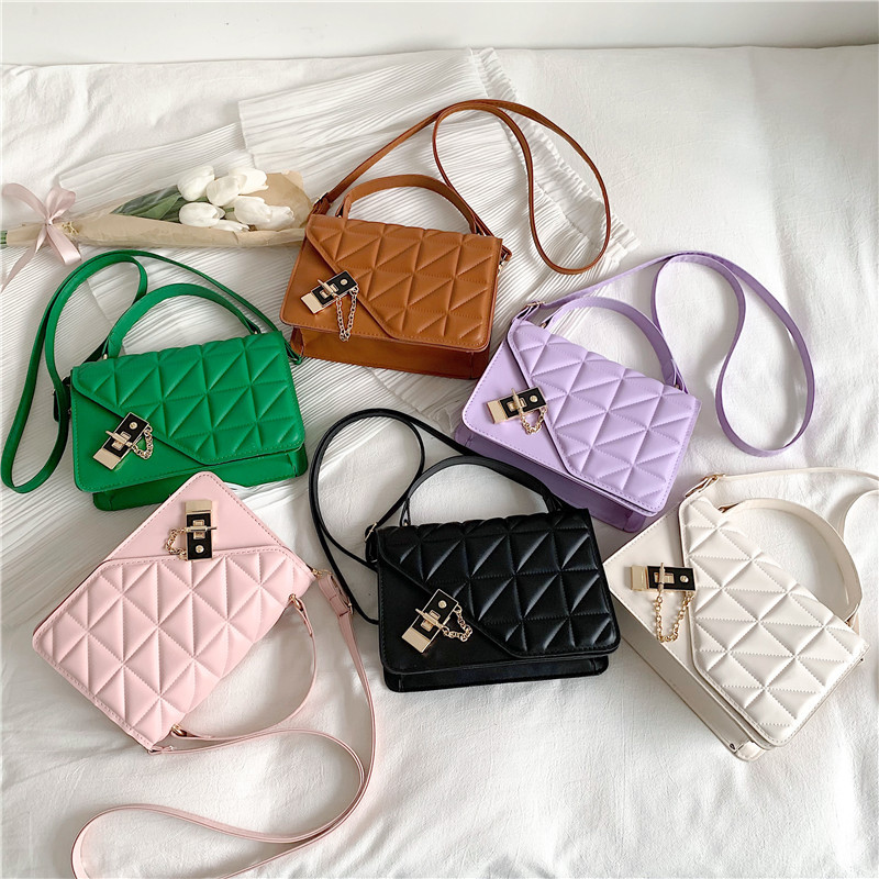 Wholesale of solid color embossed diamond-shaped ins single-shoulder crossbody women's handbags for women in 2022, which are fashionable and versatile full figure
