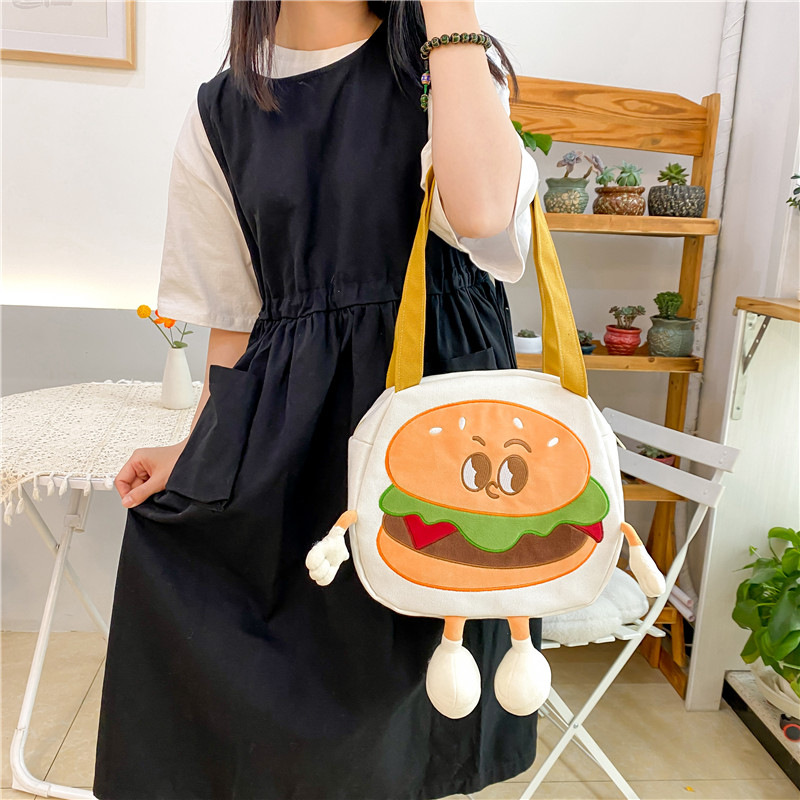 A new cartoon canvas burger crossbody handbag with large capacity, a trendy Japanese style and a girlish heart, a school backpack and birthday gift Application Scenario