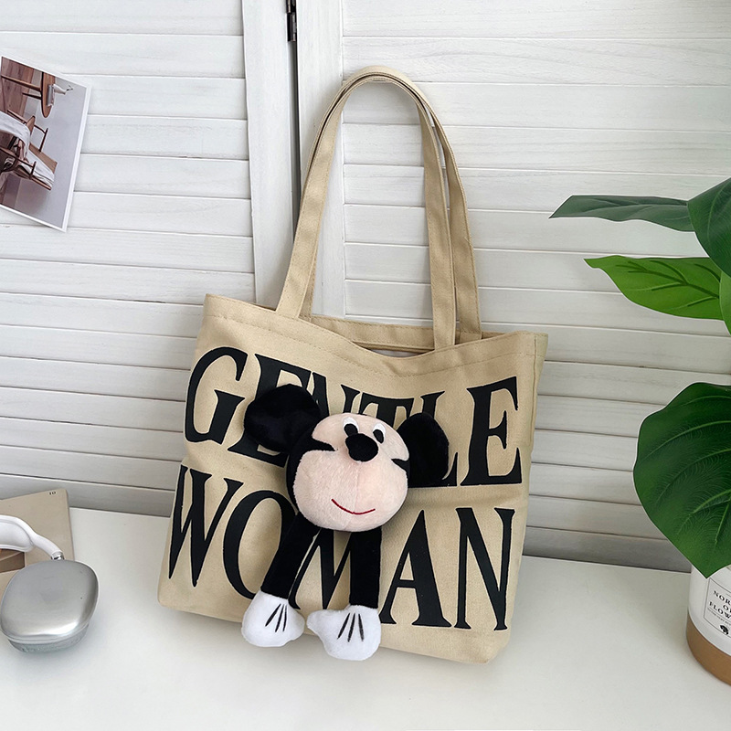 Canvas bag, doll, letter print, large-capacity single-shoulder tote bag, 2025 Spring new commuter bag full figure