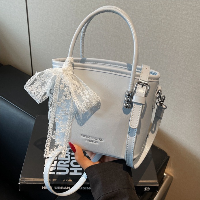 Simple and fashionable hand-held bucket bag for women 2025, new retro texture single-shoulder bag, trendy solid color crossbody bag full figure