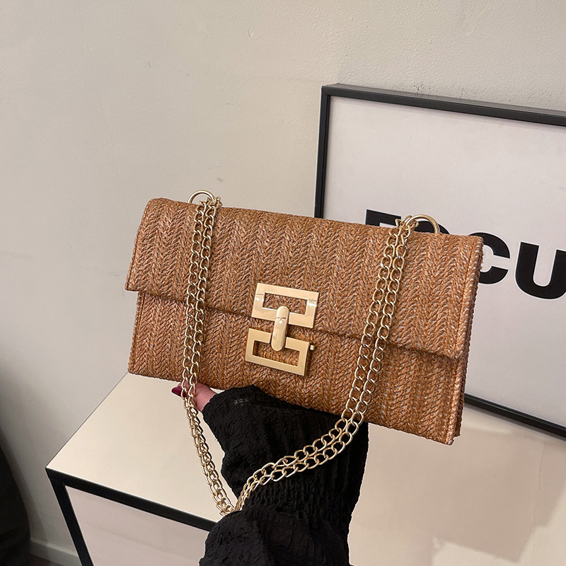 New vacation-style flip-top single-shoulder straw woven bag, casual woven bag, European and American style women's bag, lockable multi-layer chain bag full figure