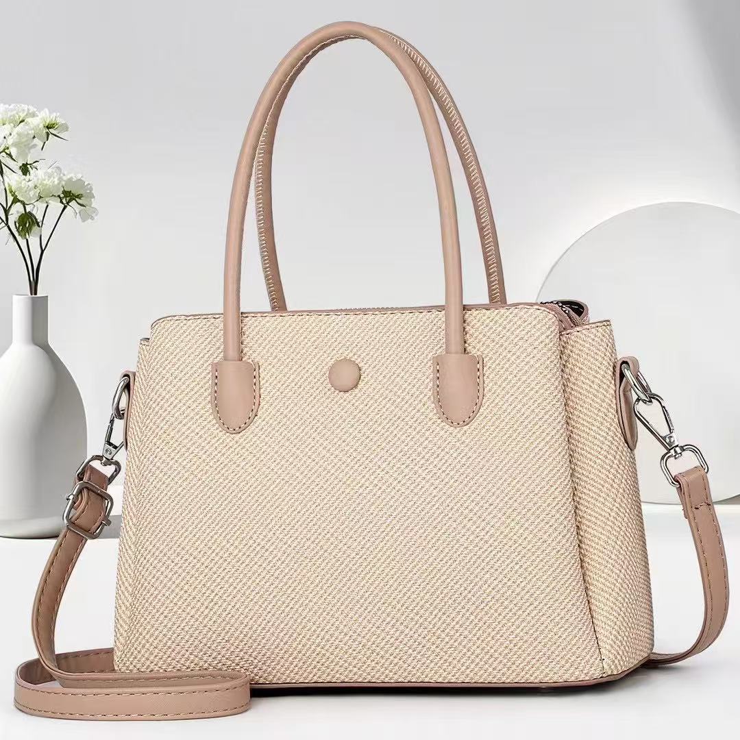 The 2025 new Senmeng women's tote bag features a retro and niche design. It is a small single-shoulder, crossbody, hand-carry bag for work full figure