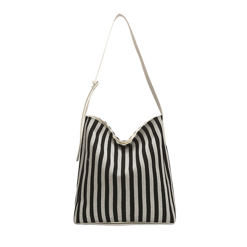 Relaxed striped canvas bucket bag for women 2025 new style, fashionable commuting underarm bag, fashionable large-capacity single-shoulder bag Item Picture