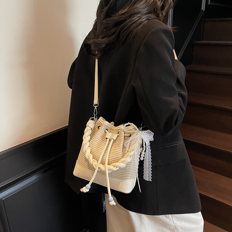 High-end hand-held bucket bag for women, 2025 new style fashionable woven drawstring single-shoulder bag, versatile commuting crossbody bag Specification drawing