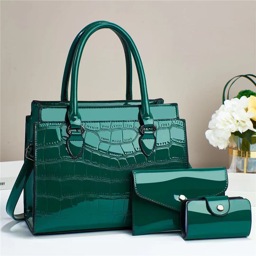 This is a stylish and elegant handbag for women, featuring a 2023 new style of shiny leather three-piece set. It is a spacious and large-capacity single-shoulder crossbody bag details Picture