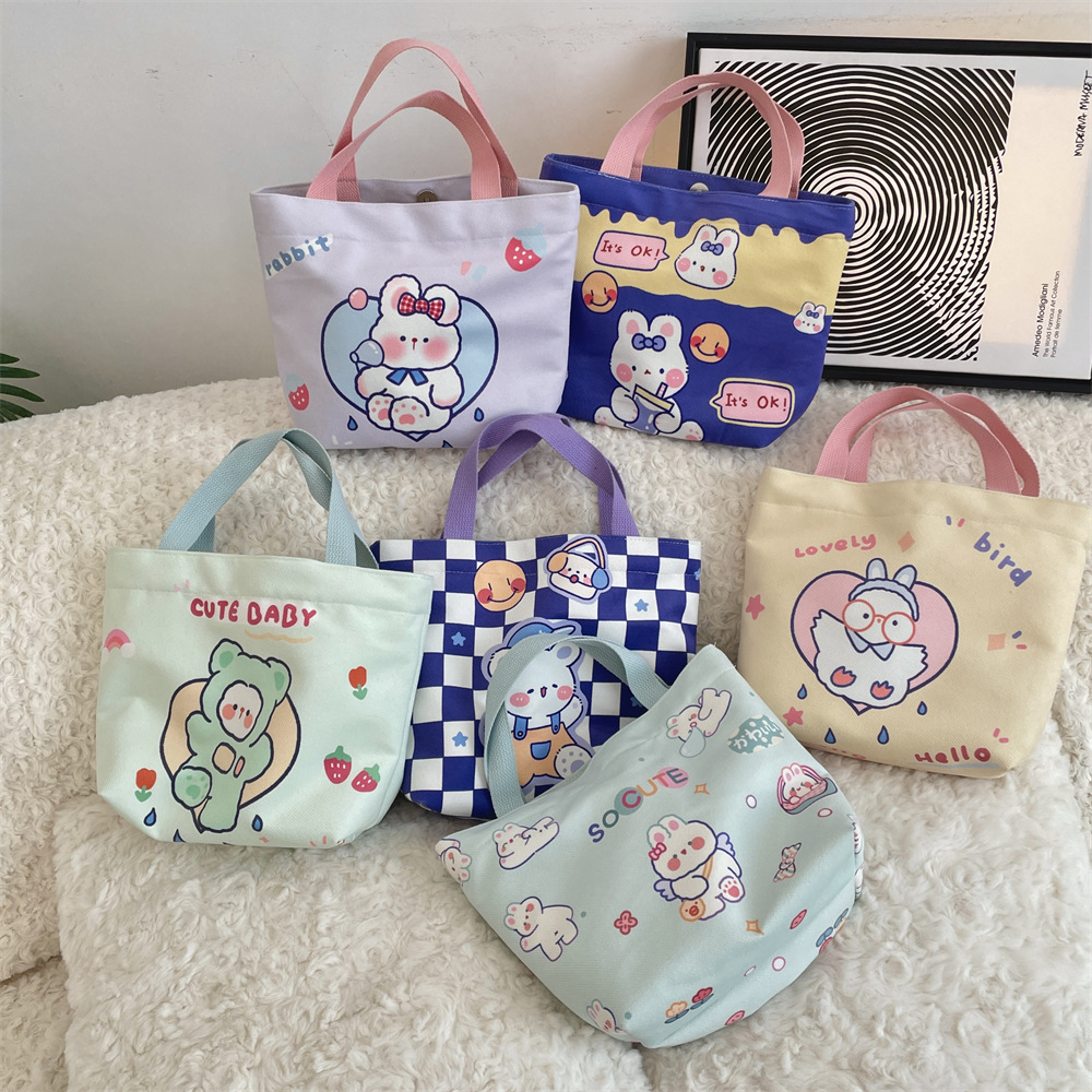41223 Cute cartoon printed handbag for women, Korean version, large-capacity canvas shopping bag, hand-held lunch bag for work full figure