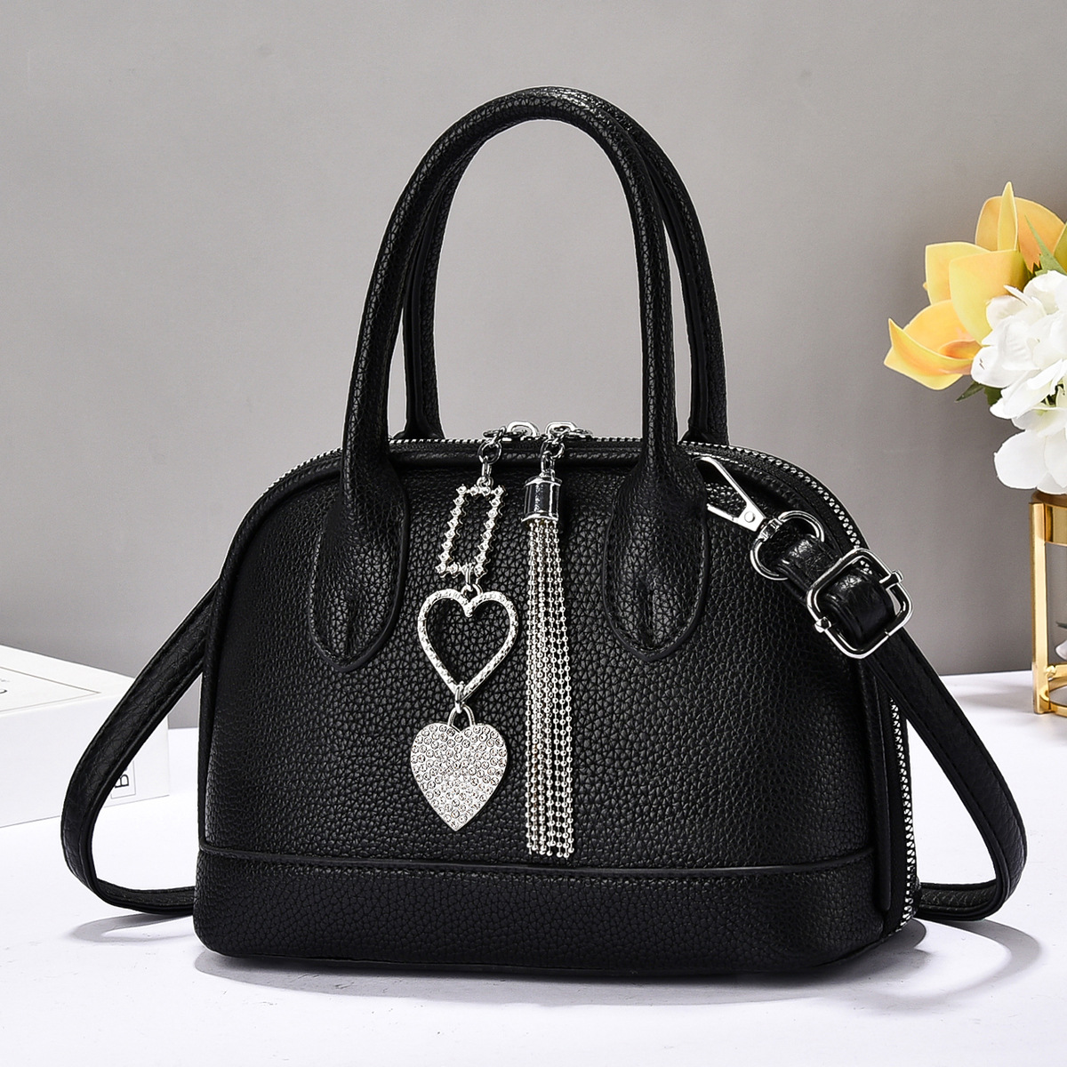 Brand women's bag 2025 new model Boston bag, solid color grainy, single-shoulder crossbody shell bag, fashionable and small for commuting full figure