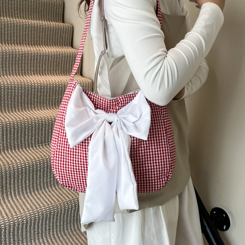 2025 New three-dimensional bow check single-shoulder bag for women's casual wear, large capacity canvas commuting underarm bucket bag details Picture