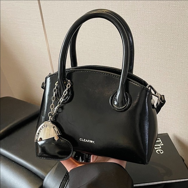 Soft leather fashionable hand-held bowling bag for women, 2025 new style casual and versatile single-shoulder bag, high-end crossbody bucket bag full figure