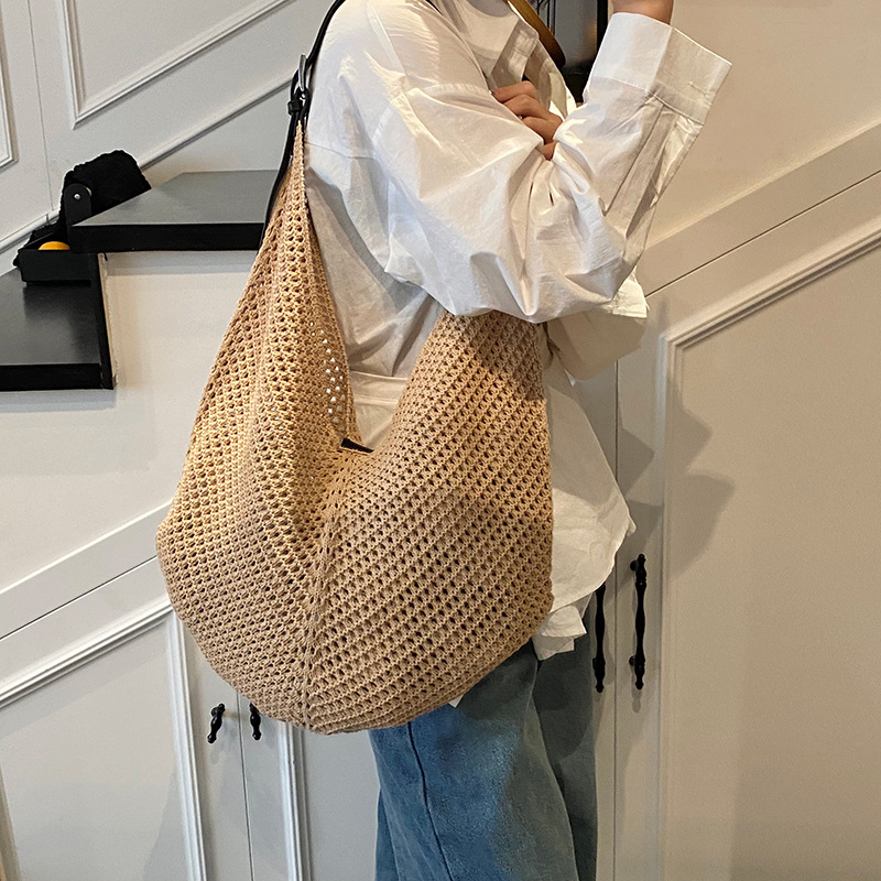 High-end soft surface hollowed-out knitted large-capacity underarm bag for women, 2025 new style, versatile and fashionable solid color single-shoulder bag details Picture