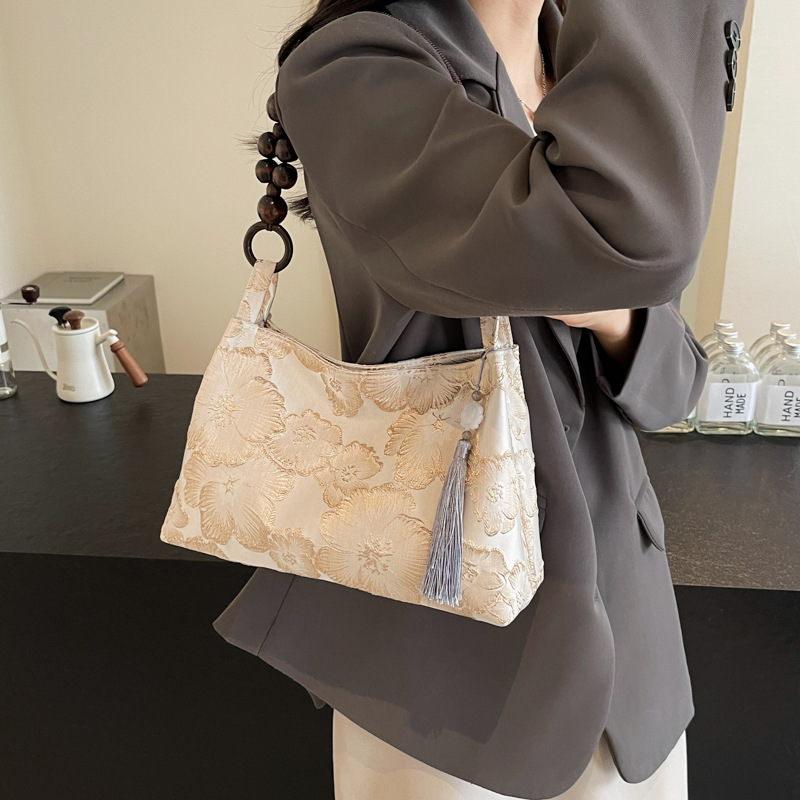 New Chinese-style niche velvet embossed dark pattern versatile underarm bag with a high-end, retro and stylish wooden bead single-shoulder handbag Application Scenario