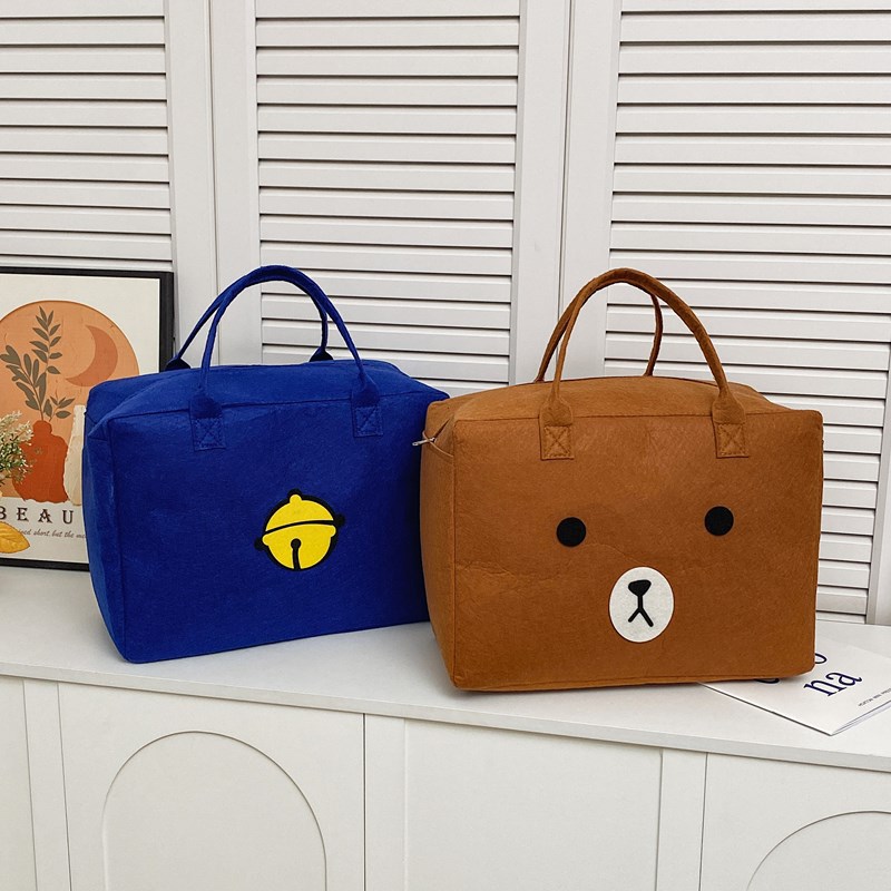Large-capacity cartoon felt storage bag, cute cartoon children's travel luggage bag, short-distance fashionable and portable storage bag details Picture