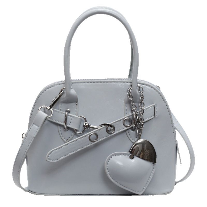 A trendy and stylish hand-held bowling bag for women, 2025 new Korean style fashionable shell bag, a super popular single-shoulder crossbody bag Item Picture
