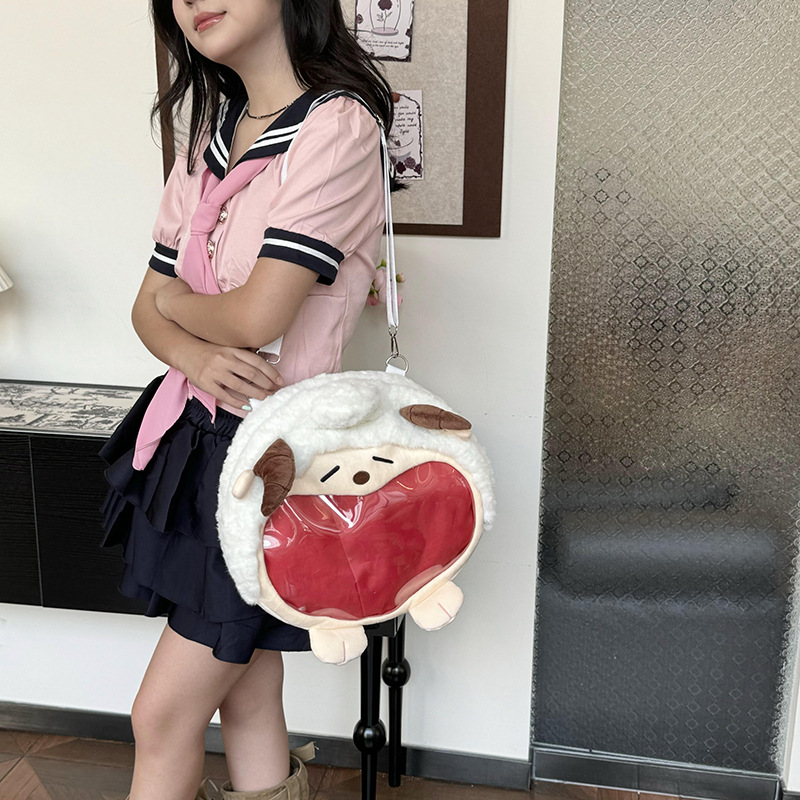 Cartoon-style Japanese-style girl's heart backpack, cute plush doll, student personality, crossbody jelly bag, transparent backpack style Application Scenario
