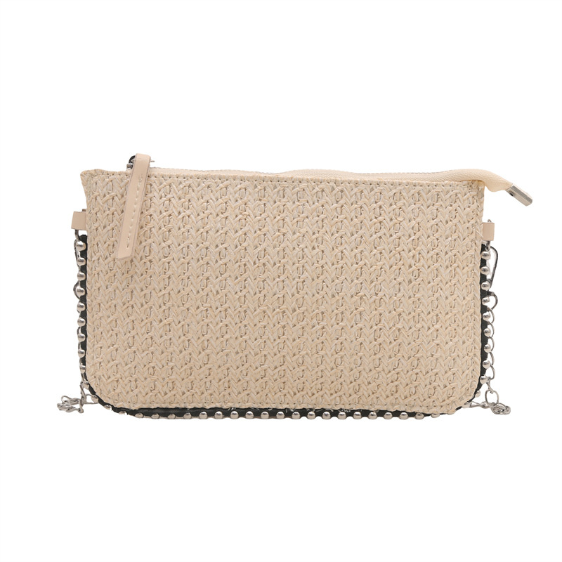 The new chain bag for women exudes a sense of high-end sophistication. It's a niche chain single-shoulder bag and clutch bag in a solid color with a simple woven pattern Item Picture