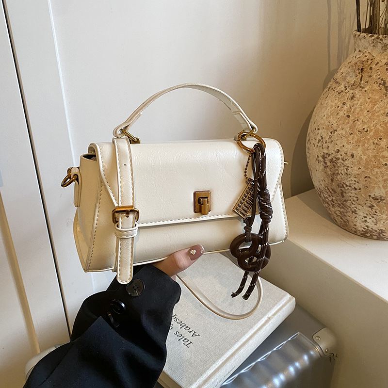 This year, the oil wax leather small bags for women are in vogue. The 2025 new style is a high-end hand-held small square bag and a retro casual crossbody bag full figure
