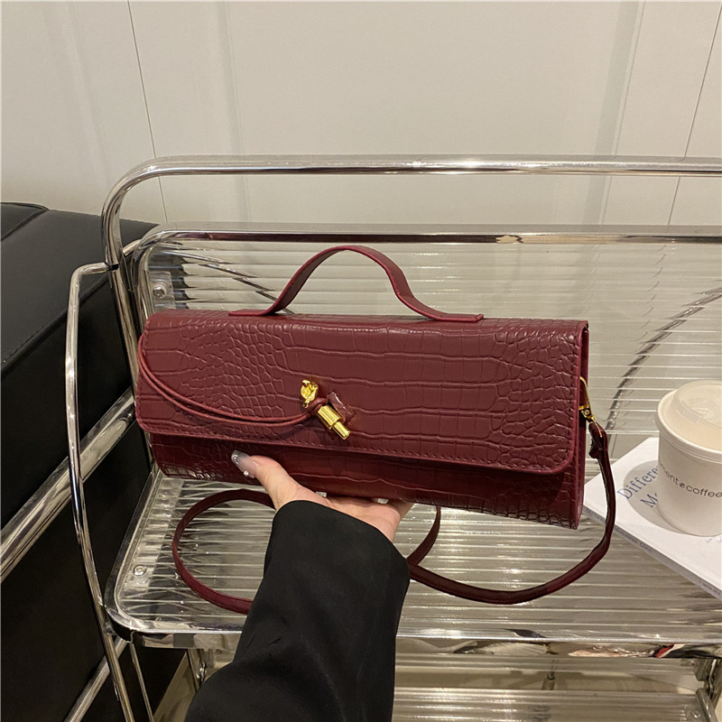 Solid color crocodile pattern dinner bag, new 2025 baguette bag, crossbody lock horizontal handbag, single-shoulder crossbody bag for women full figure