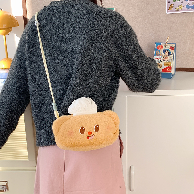 New cartoon style yellow bear plush crossbody bag, claw machine doll, cute coin purse storage bag, class pen case bag Application Scenario