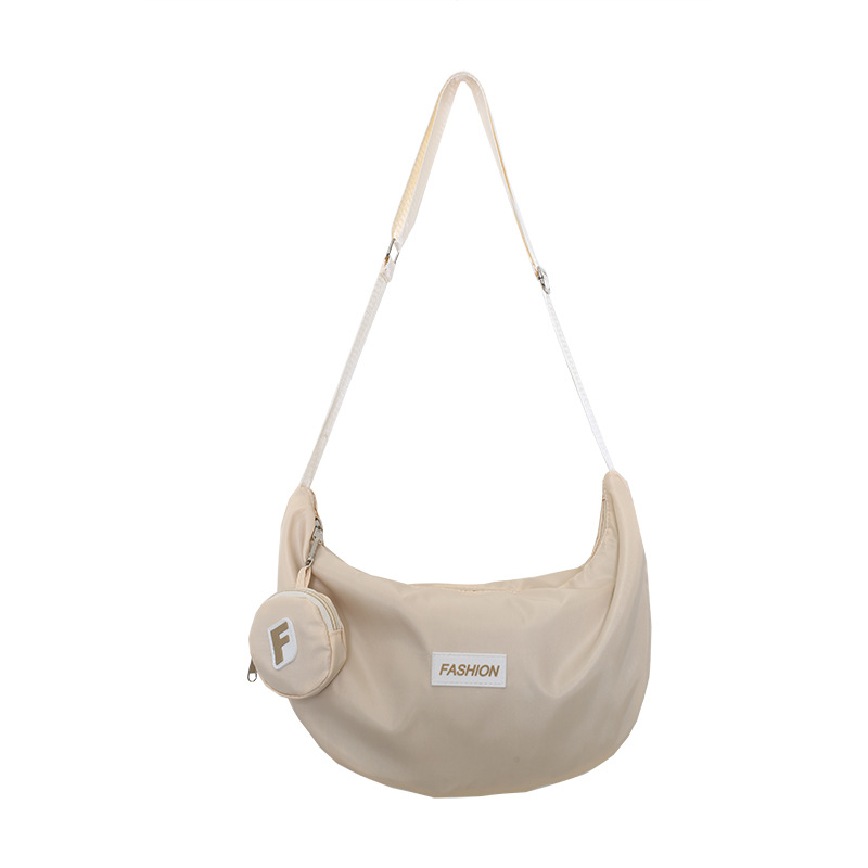 Large-capacity dumpling-wrapped crossbody bag, fashionable female nylon student single-shoulder bag, travel and class Ins-style commuting bag Item Picture