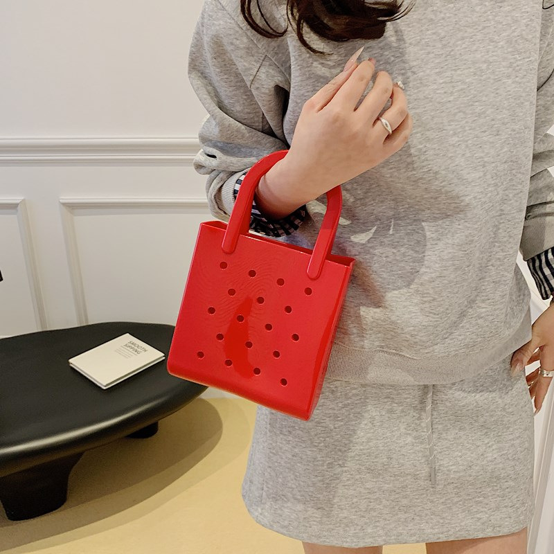 Cross-border solid color jelly bag for women 2025 new Summer hollowed-out macaron-colored beach wash basket pvc handbag details Picture