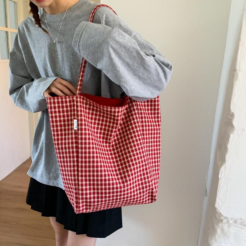 2025 New double-sided checkered canvas bucket bag for women, large-capacity commuting, Korean-style versatile single-shoulder bag for students' classes details Picture