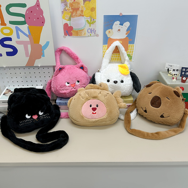 A new style of girl's hand-held crossbody bag with a cute big head doll. Carry the bag when going out to store the crossbody travel bag full figure