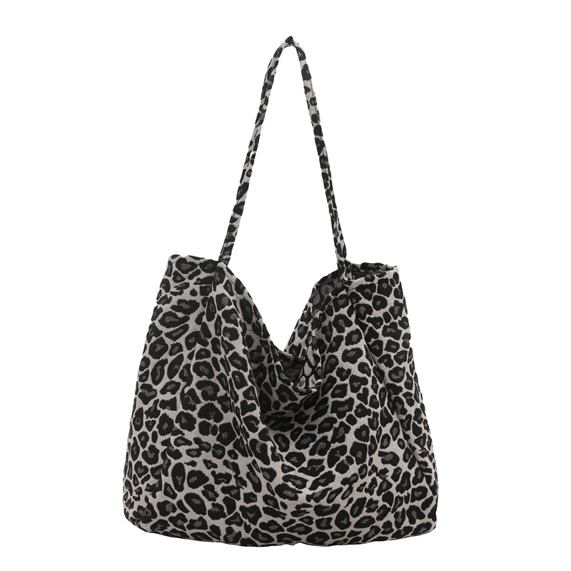 A high-end and versatile student single-shoulder crossbody bag with a retro leopard print lamp core velvet artistic canvas from Korean Instagram Item Picture