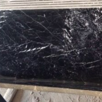Customized natural marble black and white root domestic stone floor tiles, window sills, marble countertop panels, and elegant pattern stones details Picture