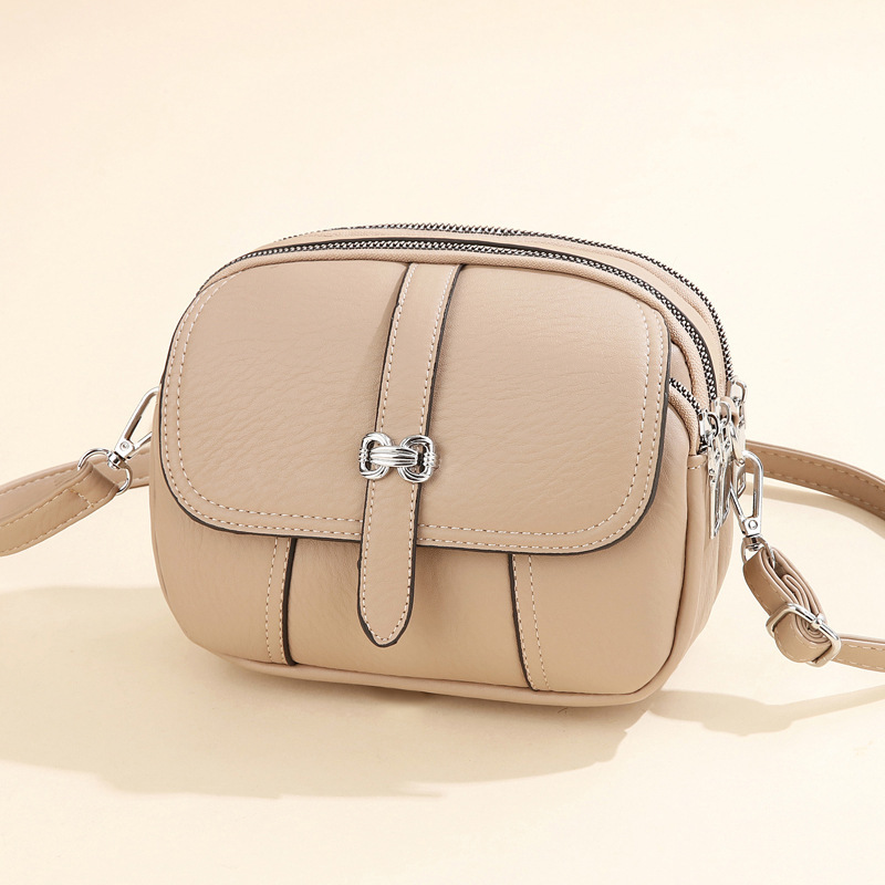 The new 2025 stylish and versatile crossbody small round bag for women, a high-end single-shoulder bag with a high-quality hand-held bag full figure