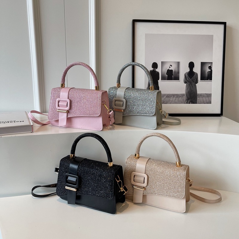 The 2023 new women's bag with belt buckle features a trendy and niche design. It is a simple and fashionable single-shoulder bag and a women's crossbody bag full figure