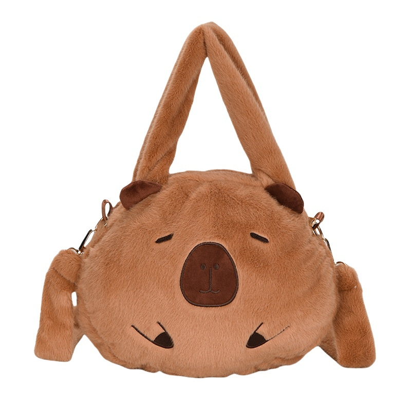 A new style of girl's hand-held crossbody bag with a cute big head doll. Carry the bag when going out to store the crossbody travel bag Item Picture
