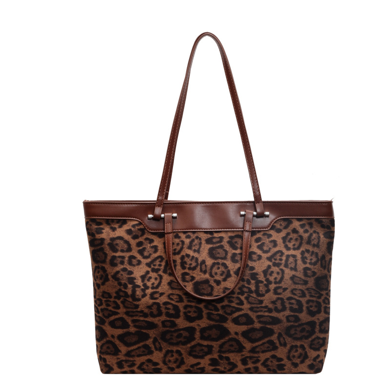 A new Korean niche leopard print canvas bag for women, a fashionable, casual and laid-back style single-shoulder bag, and a large-capacity commuter tote bag Item Picture