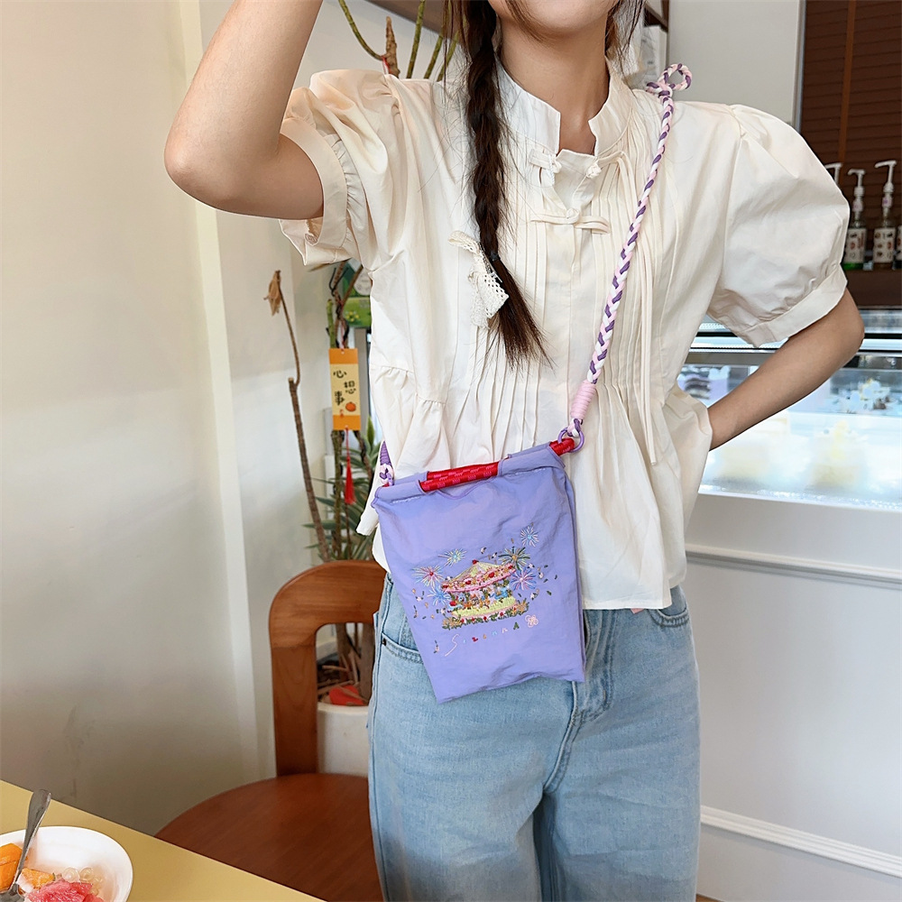 45242 Mini embroidered small cloth bag, Oxford cloth hand-held bag, student crossbody hand-held lipstick, mobile phone storage bag Application Scenario