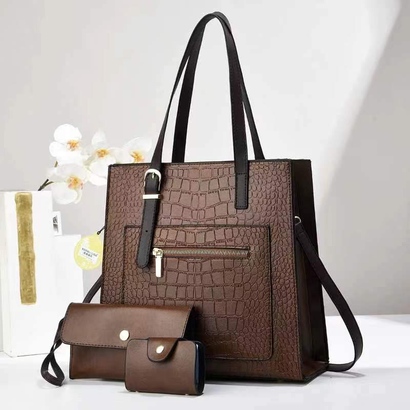 The new stone-patterned mother and child handbag is simple and fashionable, versatile for cross-border use, and features a large-capacity single-shoulder bag with a light luxury and versatility details Picture