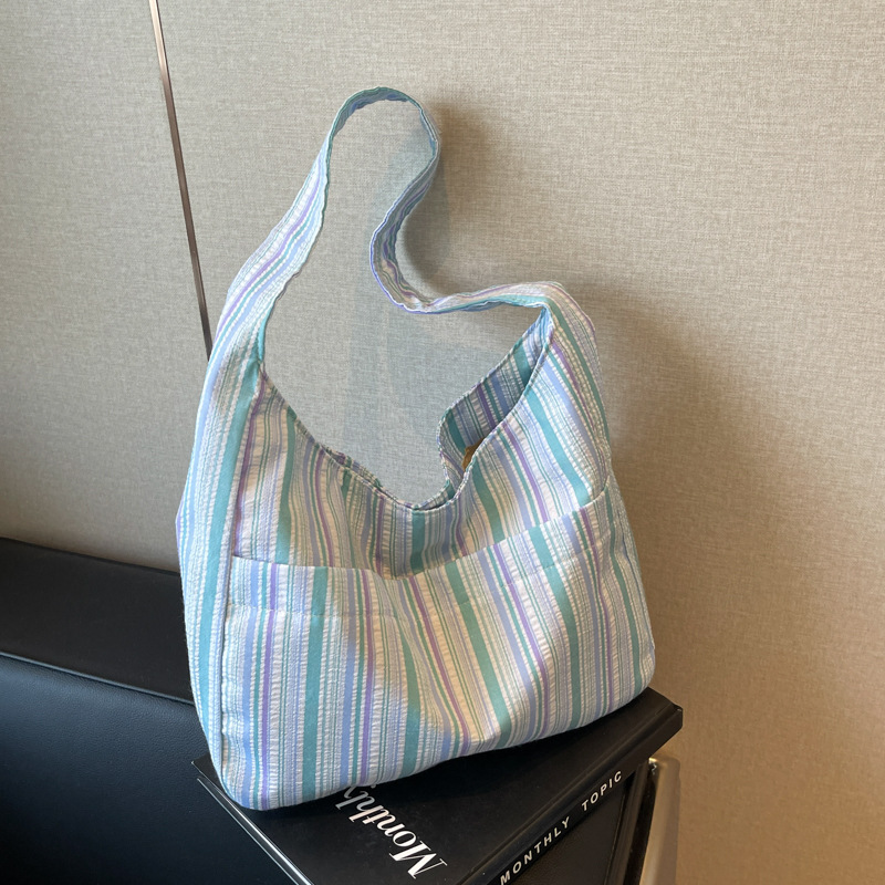 Large-capacity canvas bag for women, 2024 new summer fashion and casual underarm bag, commuter single-shoulder tote bag full figure