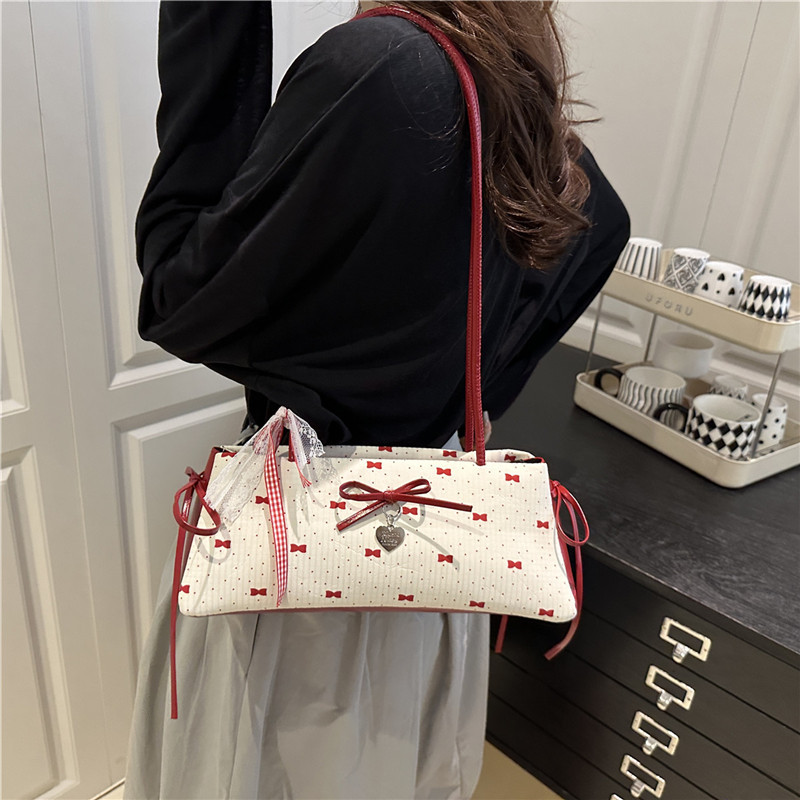 A niche color-blocking bag for women in 2025, a fashionable and versatile crossbody bag, a sweet and cool girl's hand-held bucket small bag Specification drawing