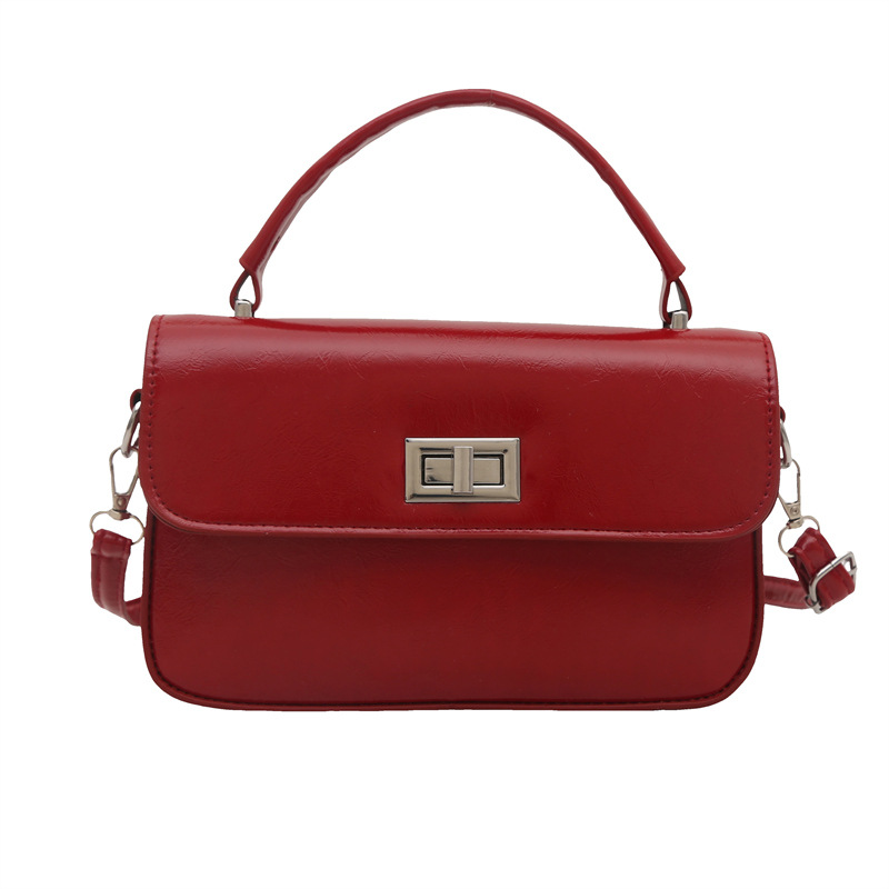 The 2025 new style women's bag is a fashionable Korean-style small square bag with a texture and lock buckle. It's a trendy small bag that can be carried by hand on one shoulder or under the armpits Item Picture