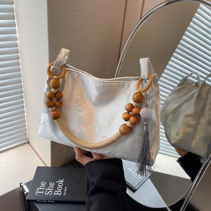 New Chinese-style niche velvet embossed dark pattern versatile underarm bag with a high-end, retro and stylish wooden bead single-shoulder handbag details Picture
